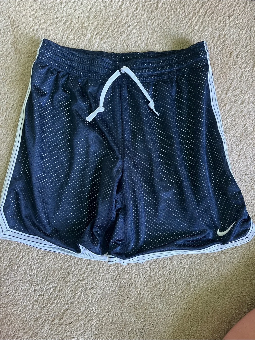 Nike Women's Black Athletic Mesh Shorts with White Trim and Drawstring